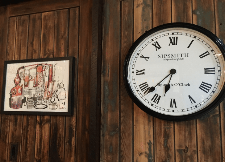 Clock at Sipsmith distillery saying 'independent spirits'