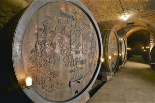 Nikolaihof wine cellar large barrel with carving