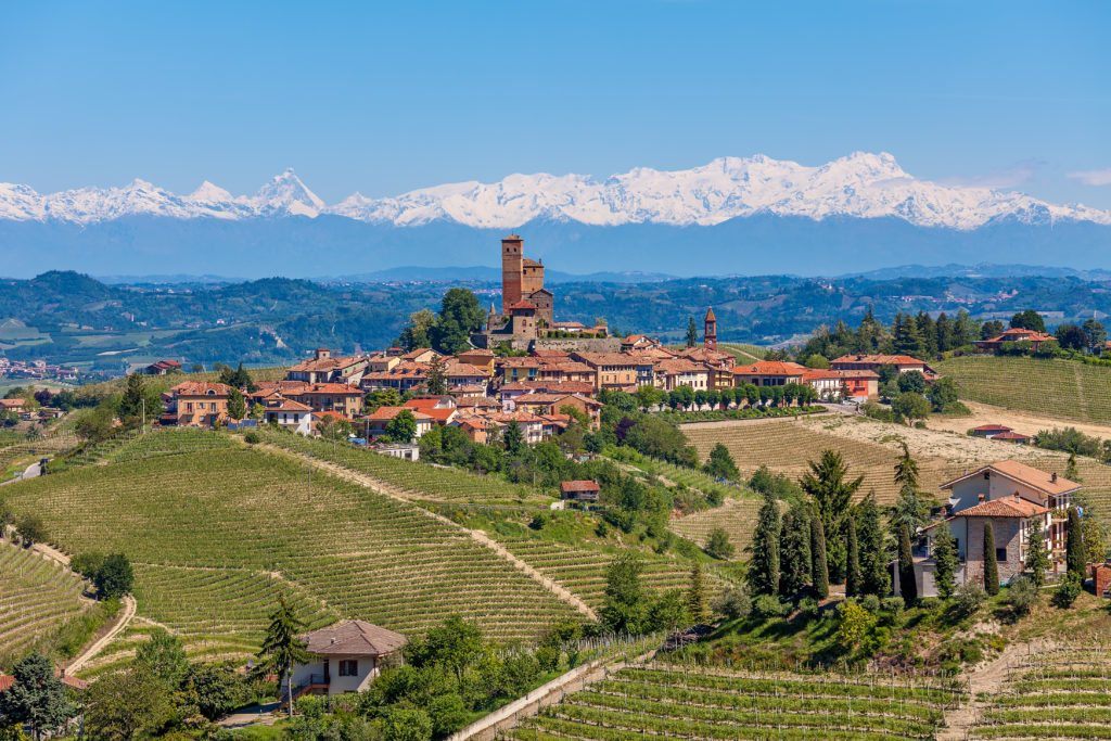 Small town in Piedmont with the view of the Alps in the background