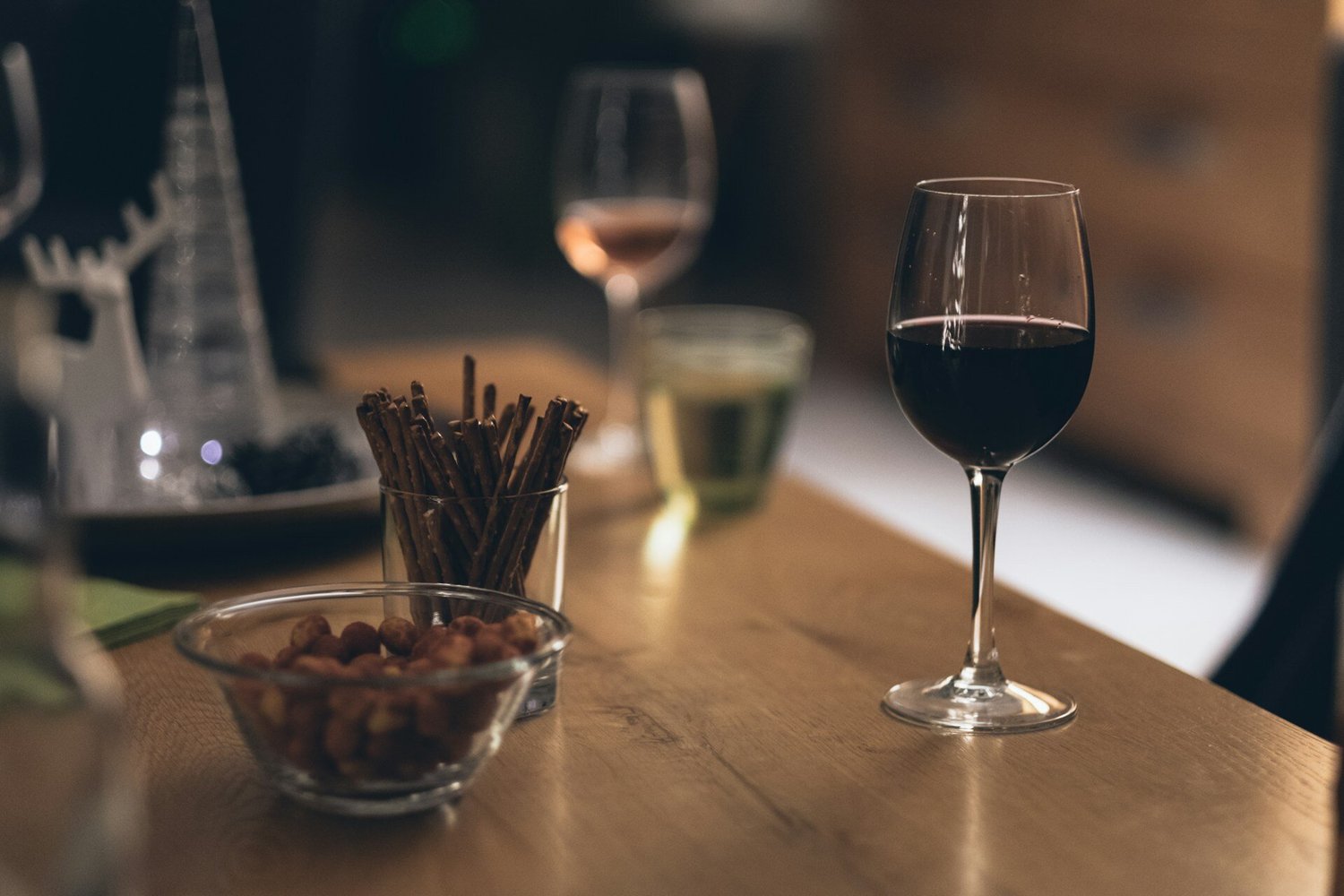 Wine glass next to chocolate